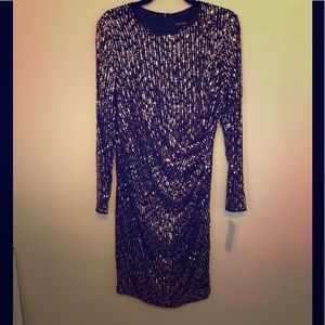 Black and gold sequence dress